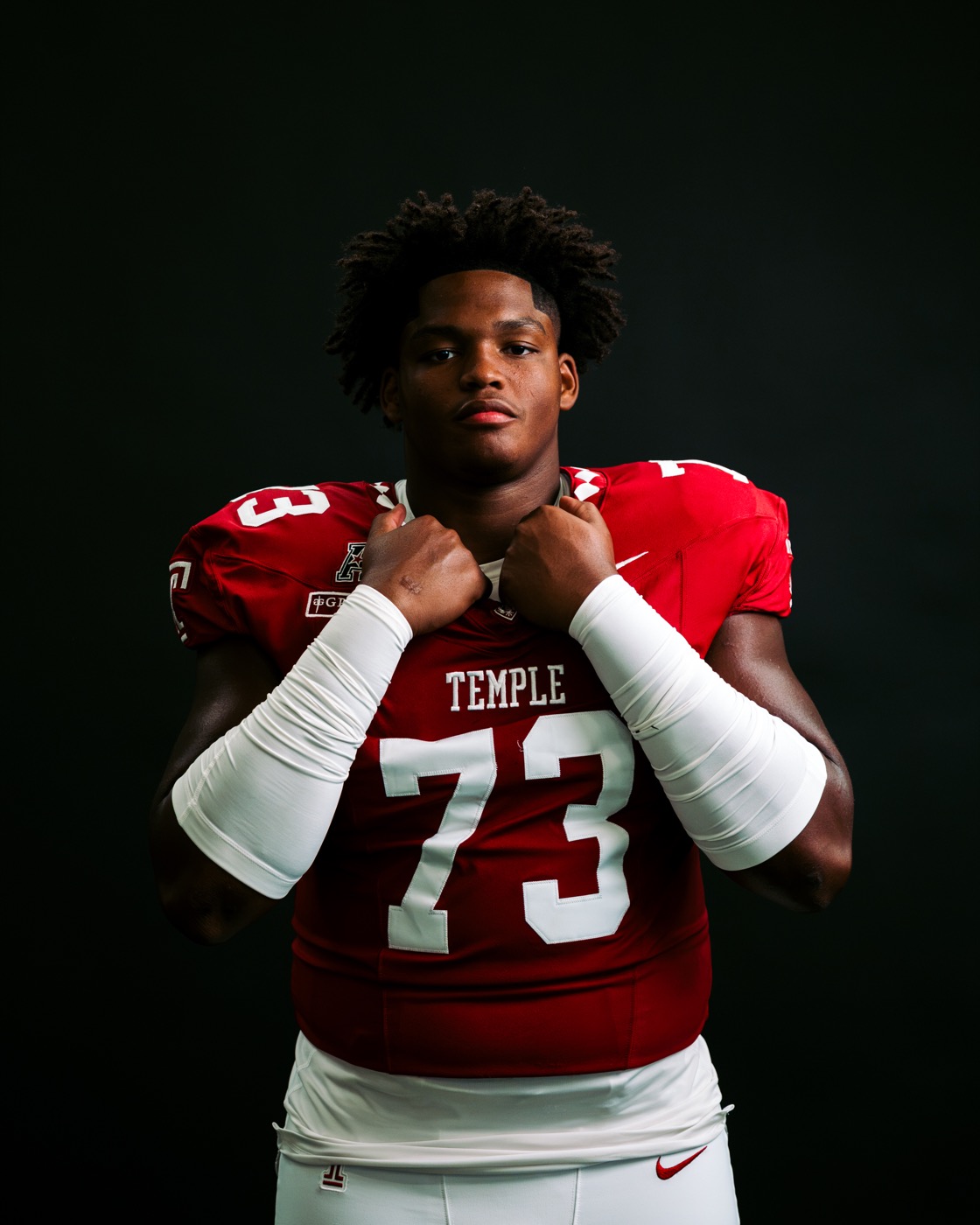 Karon Spencer in his Temple University football uniform, number 73