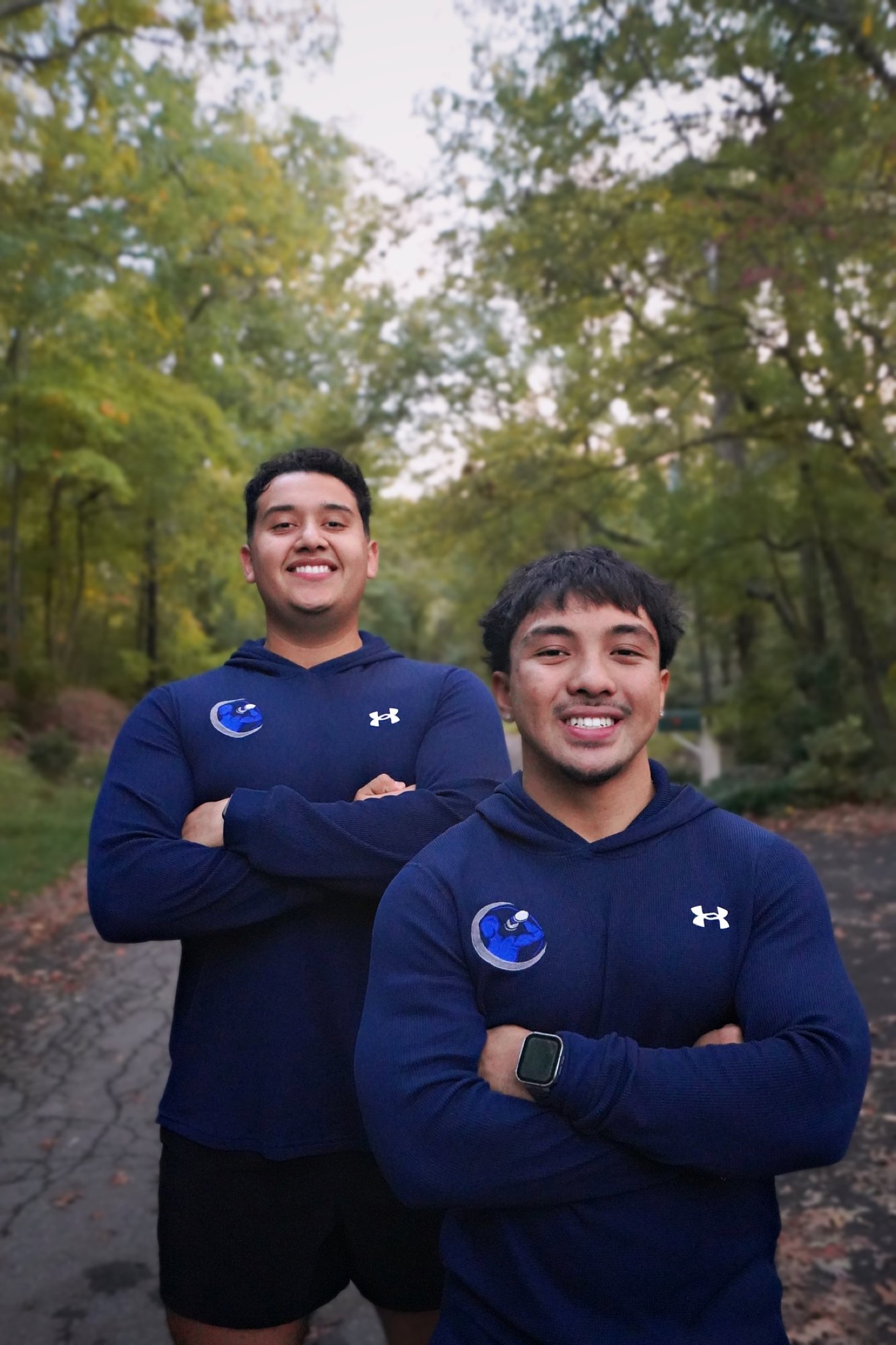 Angel Arevalo and Michael Zuniga, co-founders of Exception Training, standing together outdoors